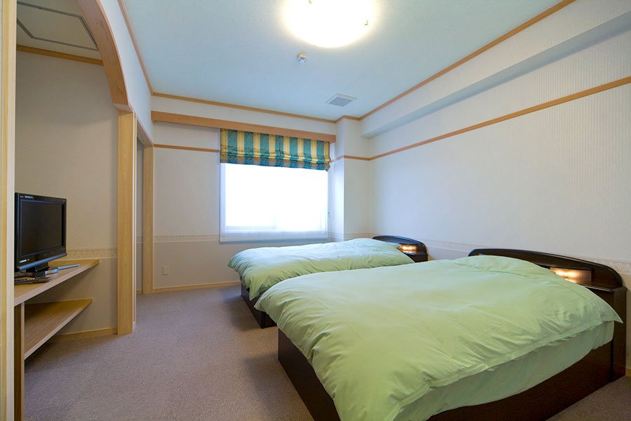 ご遺族仮眠室<br>親族室には、遠方からお越しのご親戚への配慮としてベットルームと寝具をご用意。